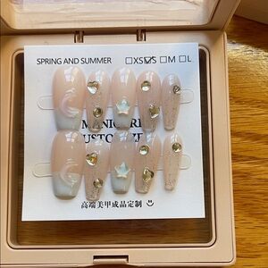 Elegant Nude Press-On Nails with Gold Accents